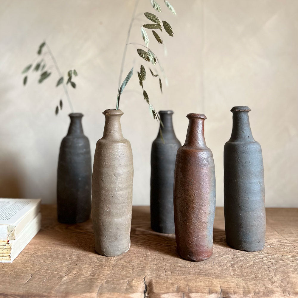 Small unglazed antique cider bottle