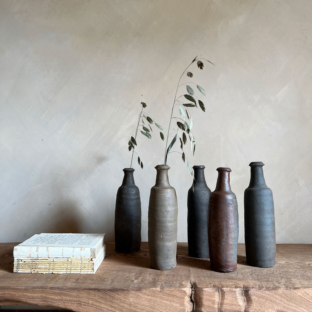 Small unglazed antique cider bottle