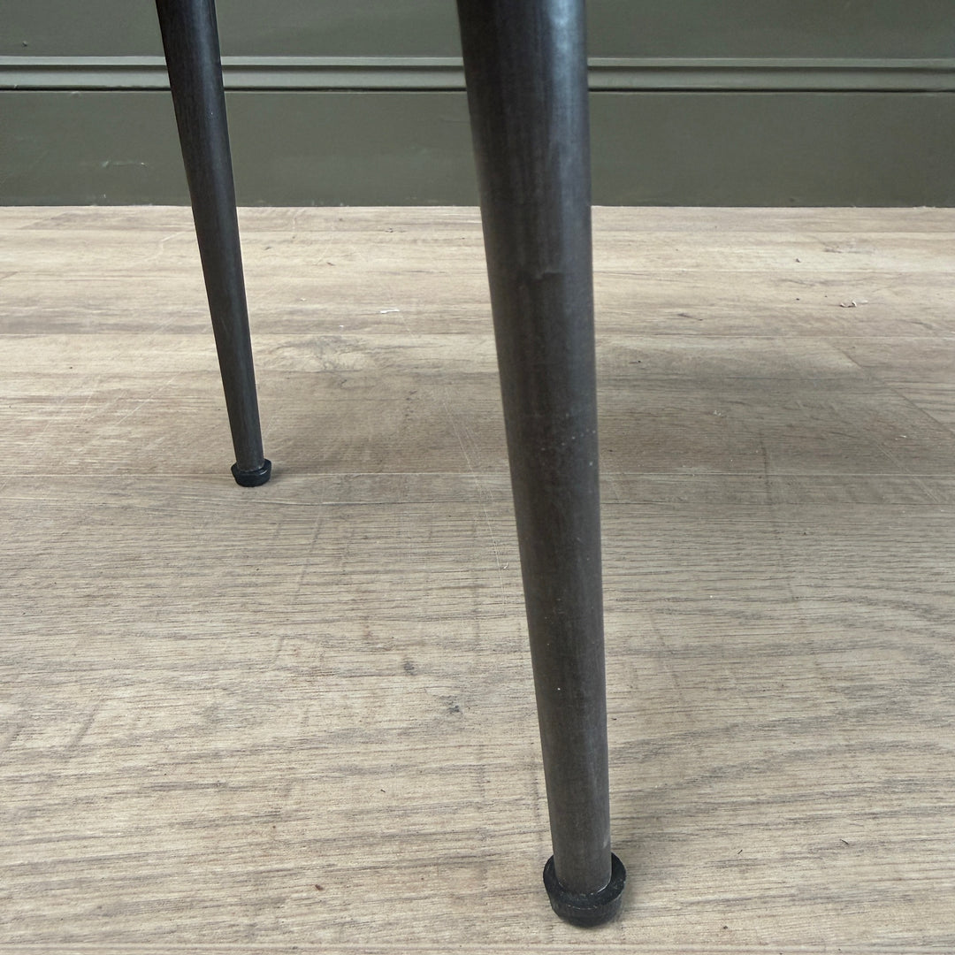 Black cast iron hairpin legs supporting the handcrafted Small Rustic Elm Side Table Eva.