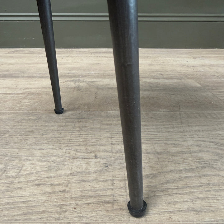 Black cast iron hairpin legs supporting the handcrafted Small Rustic Elm Side Table Eva.