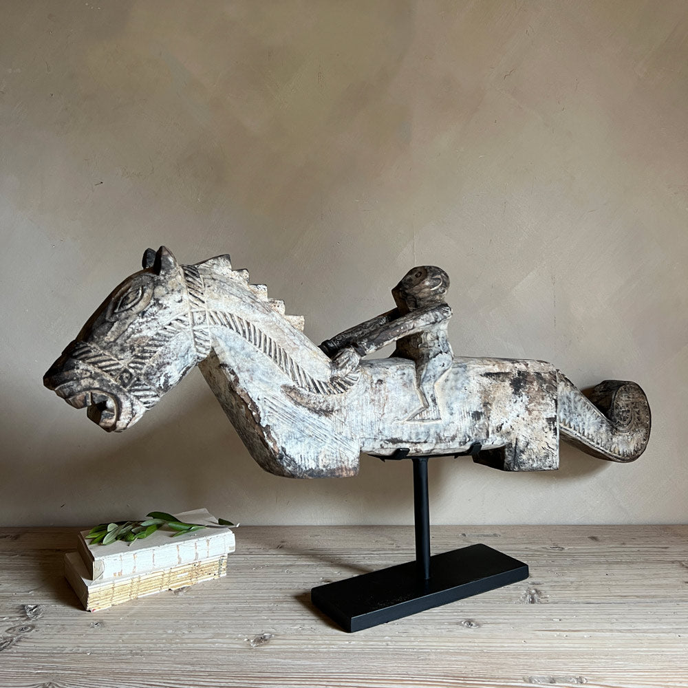 Large wooden horse and rider